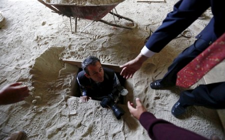 A photographer exits a tunnel connected to the Altiplano Federal Penitentiary and used by drug lord Joaquin 'El Chapo' Guzman to escape, in Almoloya de Juarez, on the outskirts of Mexico City, July 14, 2015. Mexican authorities must have colluded with Guzman to enable the country's top drug lord to escape from a maximum security prison at the weekend, Interior Minister Miguel Angel Osorio Chong said on Monday. Guzman sparked a massive manhunt after escaping from Altiplano prison on Saturday night in a mile-long underground tunnel that led from his cell into a deserted building, dealing a bitter blow for President Enrique Pena Nieto. REUTERS/Edgard Garrido