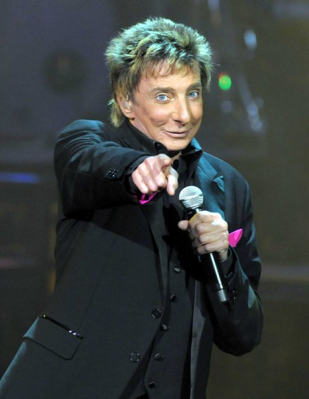 In this photo provided by the Las Vegas News Bureau, singer Barry Manilow performs his new show at the Las Vegas Hilton, in Las Vegas Friday, Sept. 26, 2008. (AP Photo/Las Vegas News Bureau, Brian Jones) ** NO SALES **